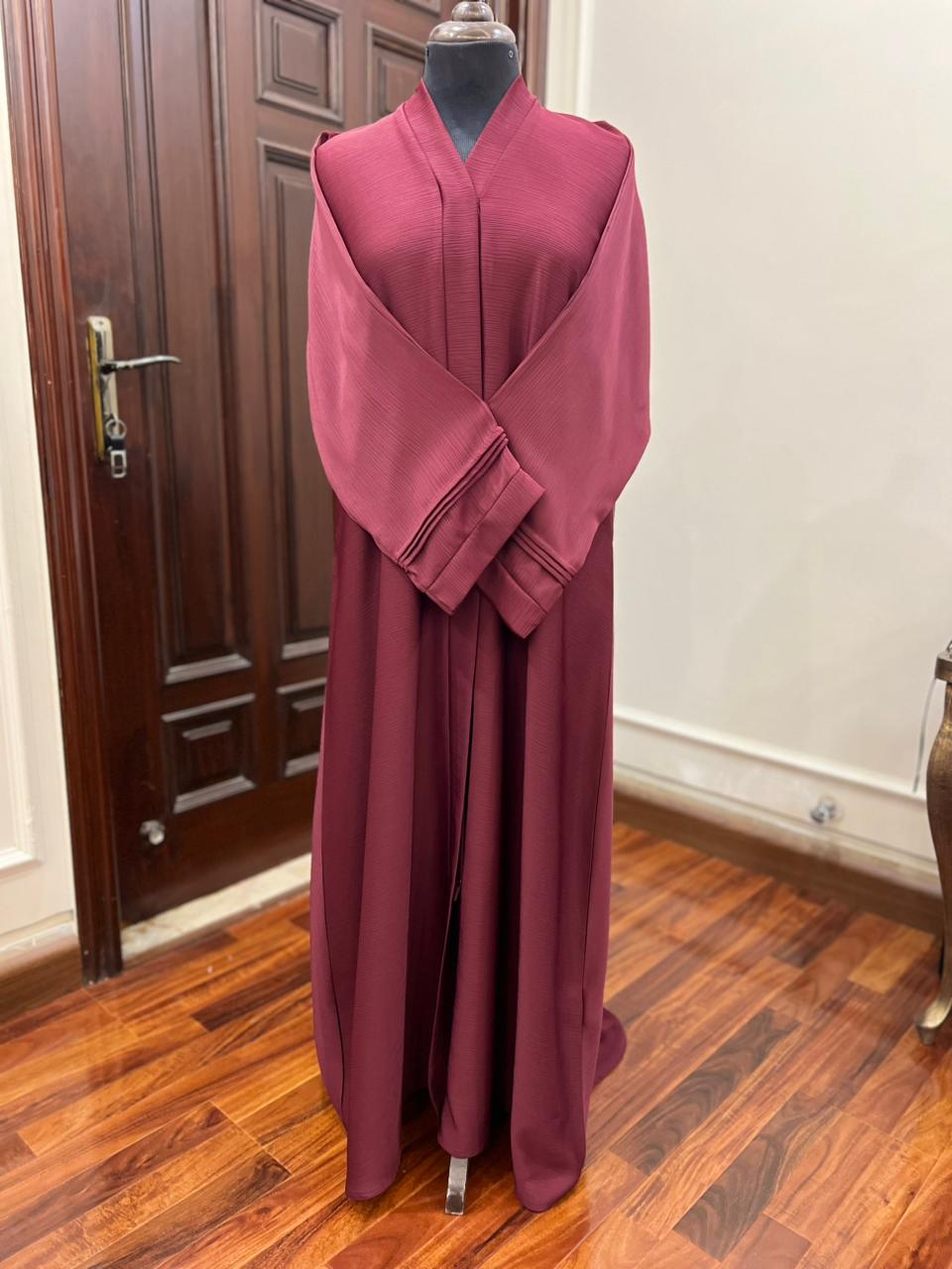 Maroon dress on a mannequin